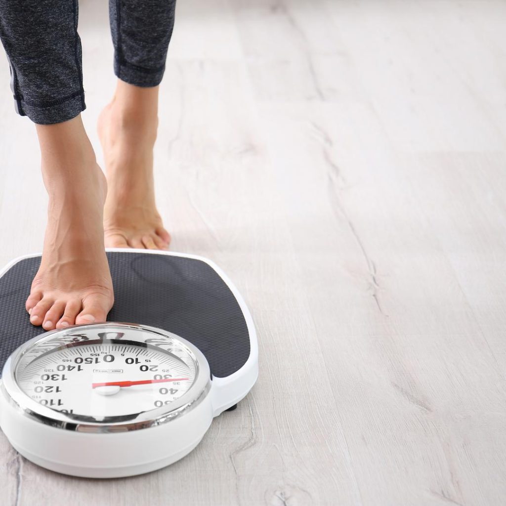 Checking Weight On The Scales